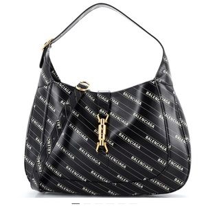 Gucci Black Shoulder Bag with Gold Accents
